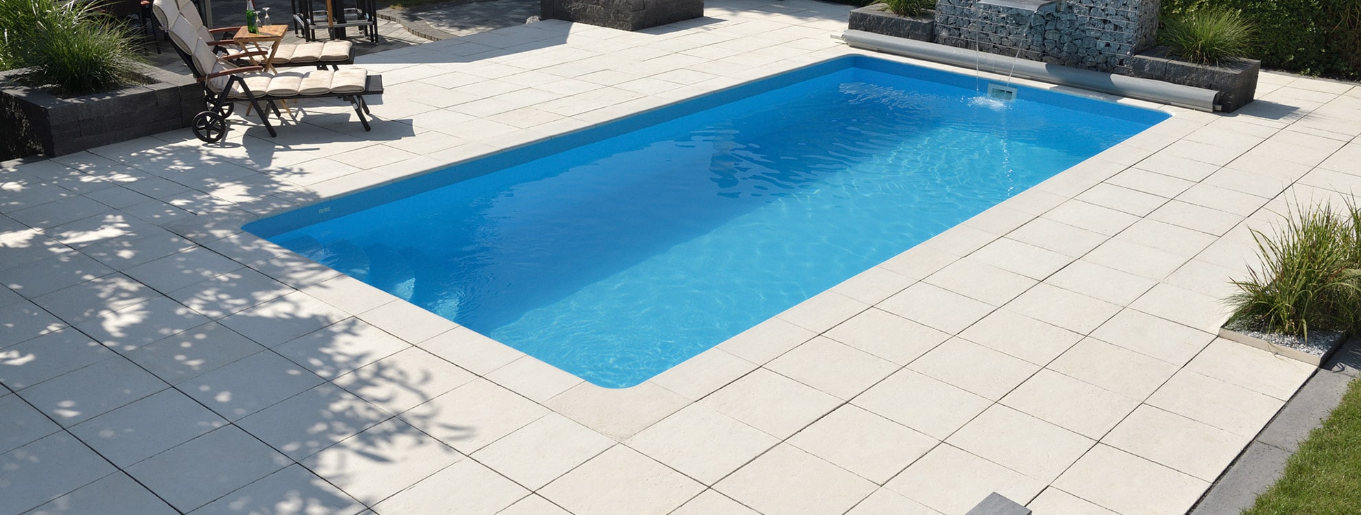 Poolumrandung aus Beton <br />
Inspirierend und stilvoll